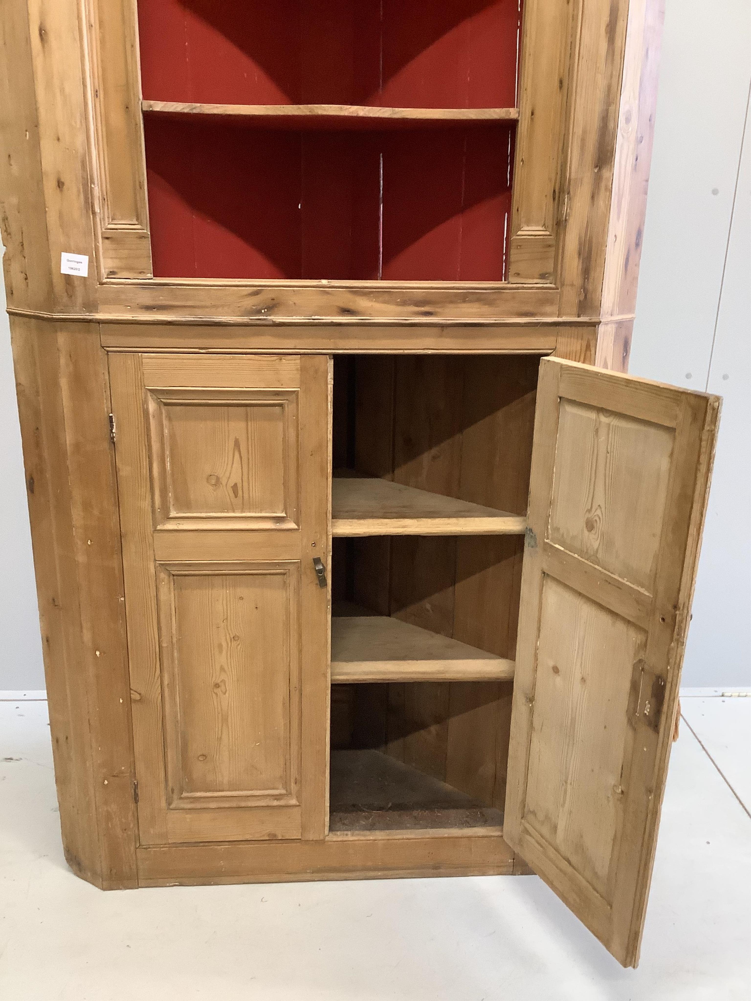 A George III pine standing corner cupboard, width 108cm, depth 40cm, height 205cm. Condition - fair